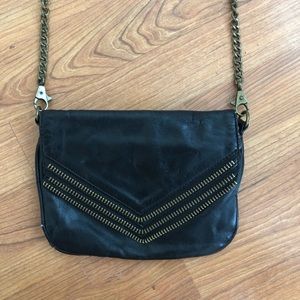 Black Matt + Nat purse with zipper detailing.